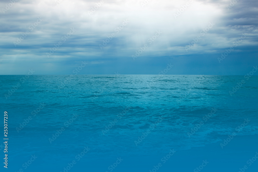 Background image of a bright blue sea