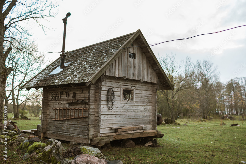 A small rustic wooden sauna in Pakri islands, Estonia A small rustic wooden sauna in Pakri islands, Estonia