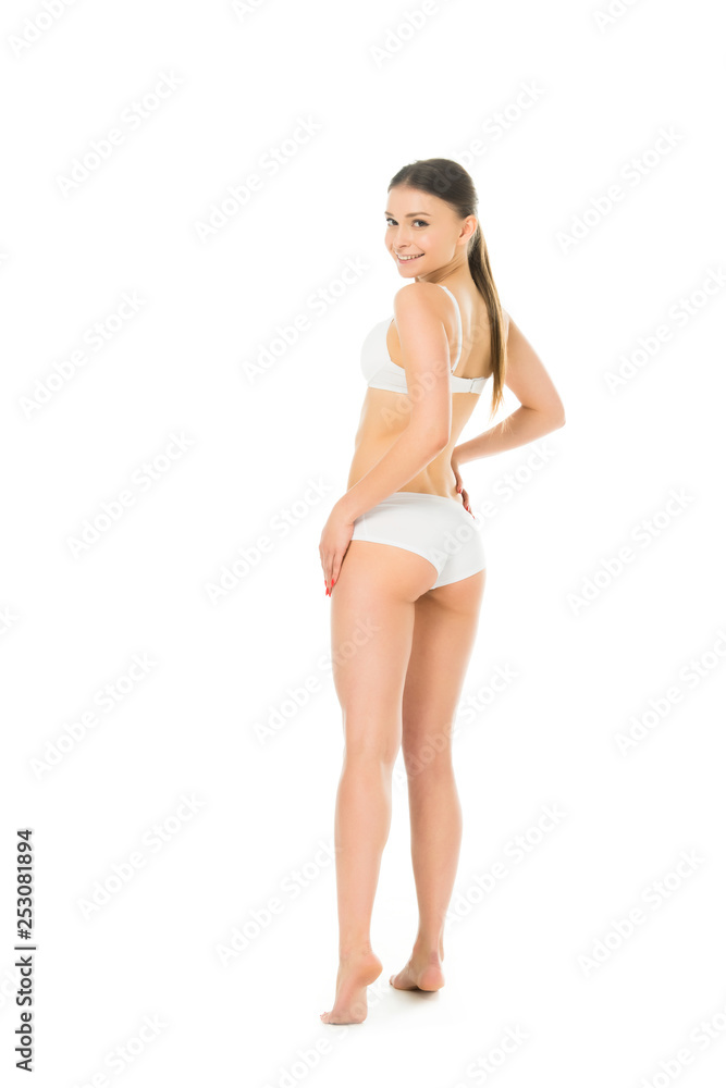 barefoot smiling sexy young woman in underwear posing with hands on hips isolated on white barefoot smiling sexy young woman in underwear posing with hands on hips isolated on white