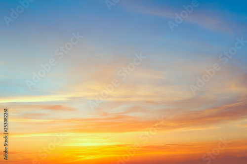 Majestic sunrise sundown sky with gentle colorful clouds © Taiga