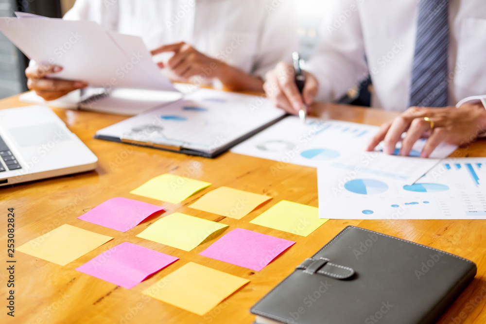 Business team data analyzing income charts document during discussion explain strategy meeting. on start-up project teamwork together. Business team data analyzing income charts document during discussion explain strategy meeting. on start-up project teamwork together.