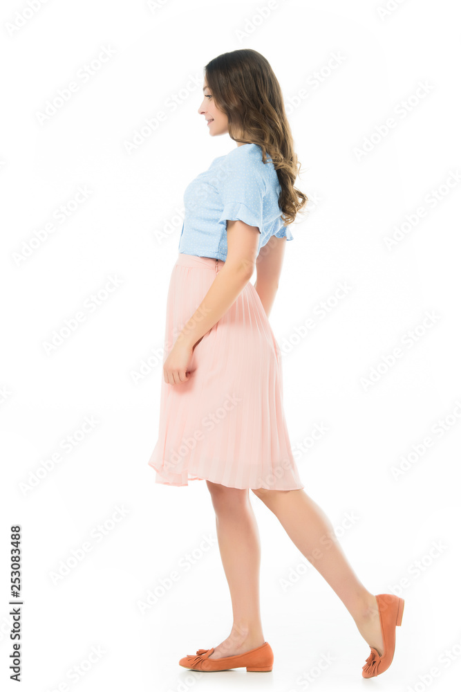 side view of pretty smiling elegant girl posing isolated on white side view of pretty smiling elegant girl posing isolated on white
