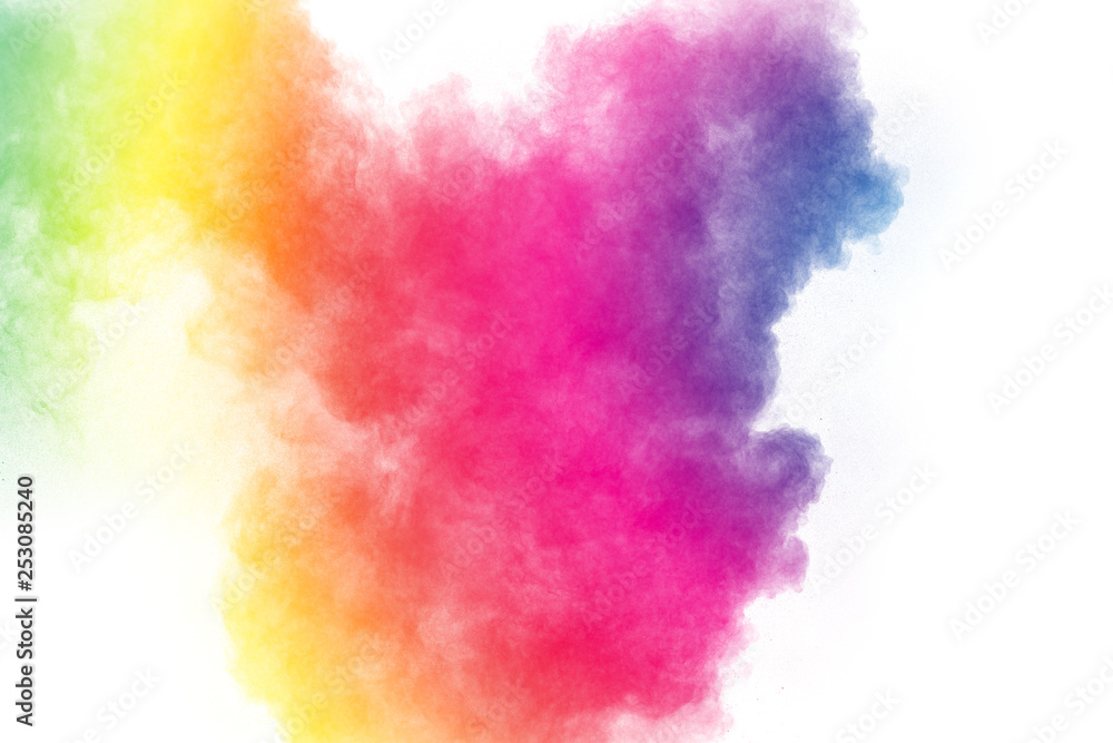 Fototapeta premium Multicolored particles explosion on white background. Colorful dust splatter on white background.