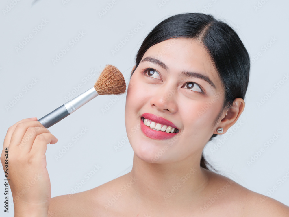 Asian beautiful woman close up face cosmetic skin care concept on white background Asian beautiful woman close up face cosmetic skin care concept on white background