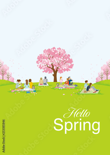 People picnic in spring nature, including words “Hello Spring” - Vertical layout