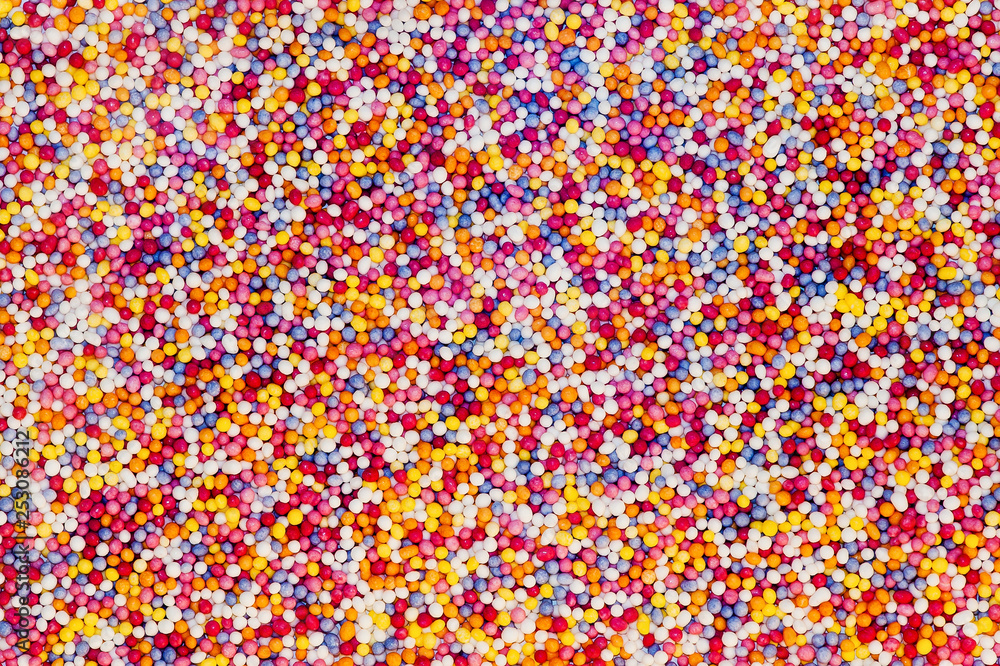 hundreds and thousands scattered to form a rainbow pattern hundreds and thousands scattered to form a rainbow pattern