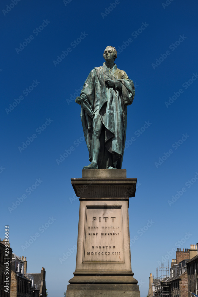Bronze sculpture of William Pitt the Younger a British Prime Minister on George Street Edinburgh Scotland with blue sky