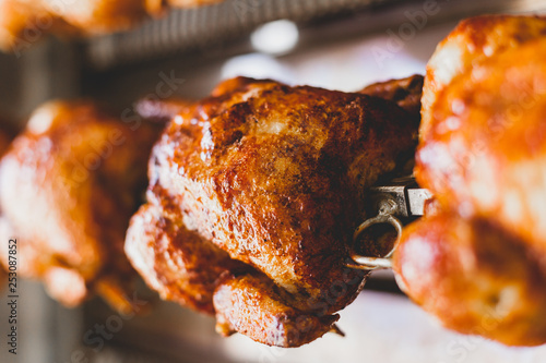Roasted chicken on rotisserie 