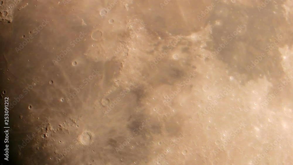 Very close full moon is rising rapidly at night Very close full moon is rising rapidly at night