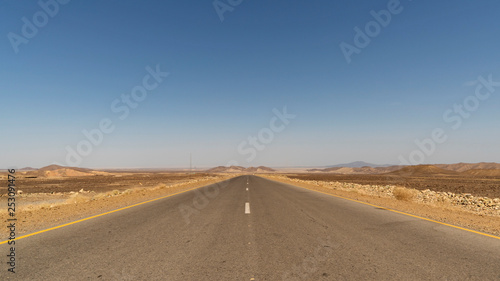 The journey to Danakil Depression is long but most of it is today paved. An empty road of Afar region in Ethiopia.