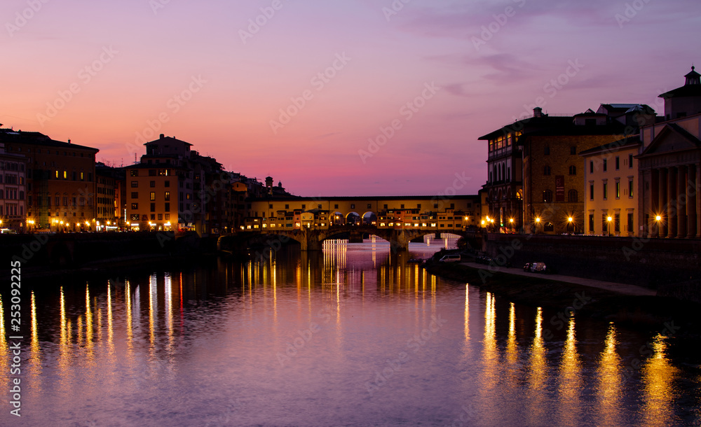 Fototapeta premium florence,tuscany/Italy 20 february 2019 : the ponte vechio bridge snapshot taken at golden hour beautiful colors and excellent architecture