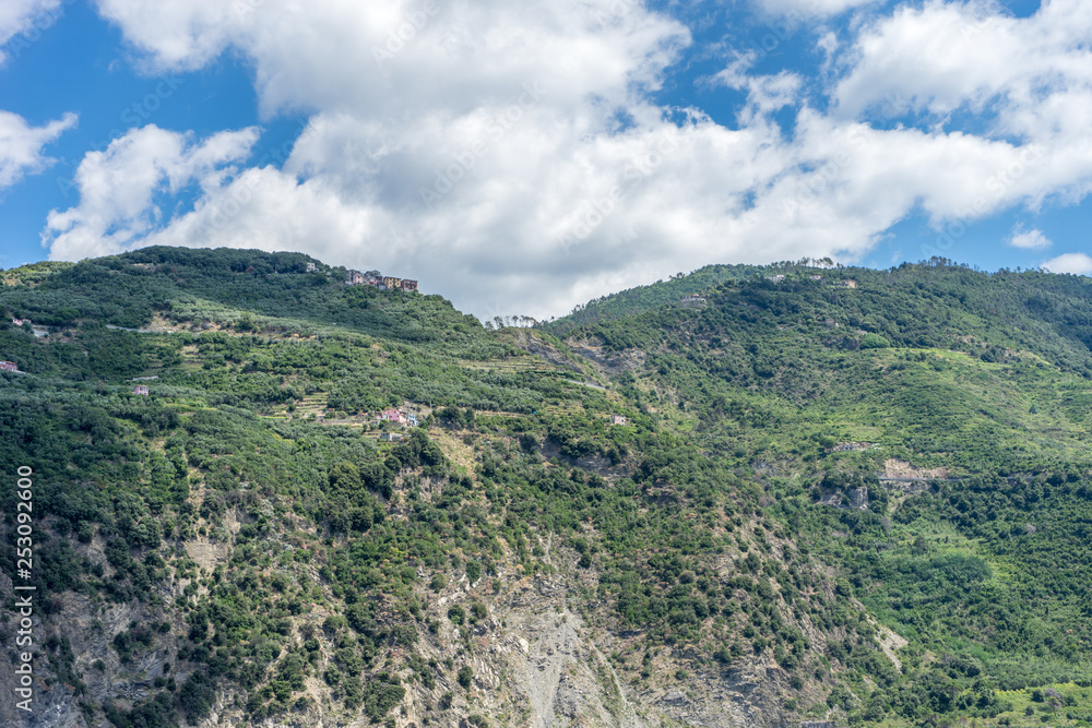 Italy, Cinque Terre, Monterosso, a large mountain in the background