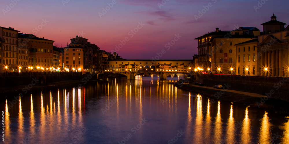 florence,tuscany/Italy 20 february 2019 : the ponte vechio bridge snapshot taken at golden hour beautiful colors and excellent architecture