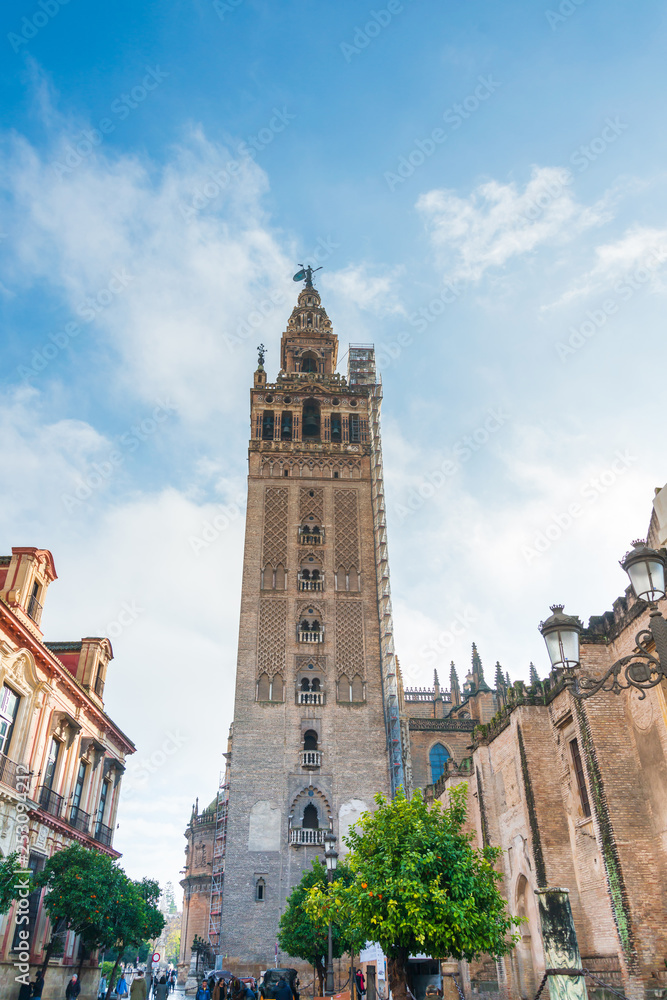 SEVILLA, SPAIN - January 13, 2018: La Giralda Tower fortissima in Sevilla city, Spain