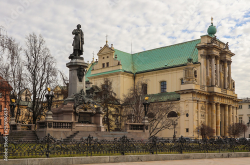 Adam Mickiewicz monument and Church of Saint Joseph at the center of Warsaw, Poland