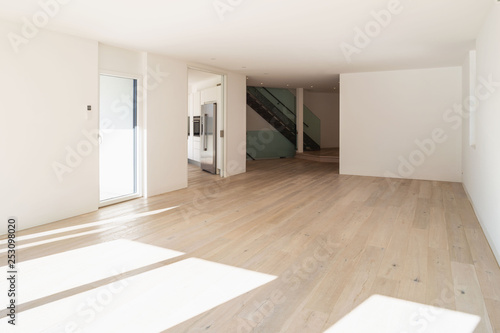 Empty white living room interior with parquet