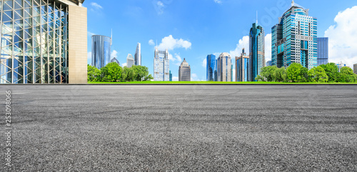Canvas Print Asphalt road ground and modern city commercial building scenery in Shanghai