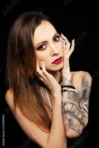 portrait of beautiful girl with makeup and red lips