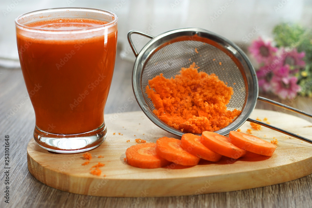 fresh carrot juice healthy drink and carrot slices served on the table fresh carrot juice healthy drink and carrot slices served on the table
