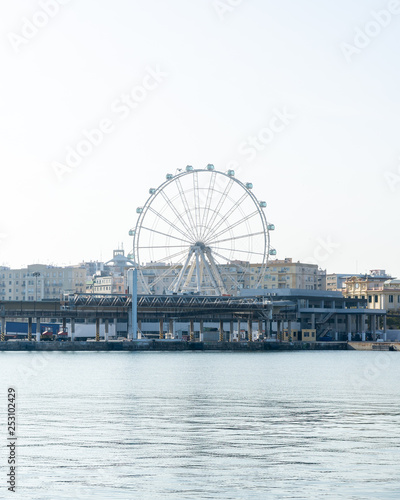 Ferris wheel of the port of Malaga on a sunny day