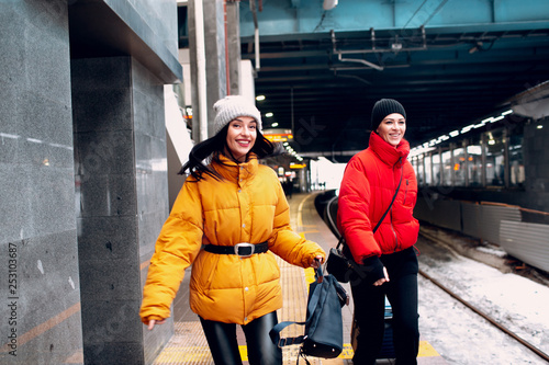 Young female and railway train.