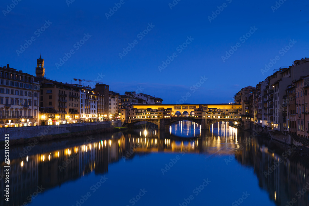 Famous bridge Ponte Vecchio on the river Arno in Florence, Italy. Evening view