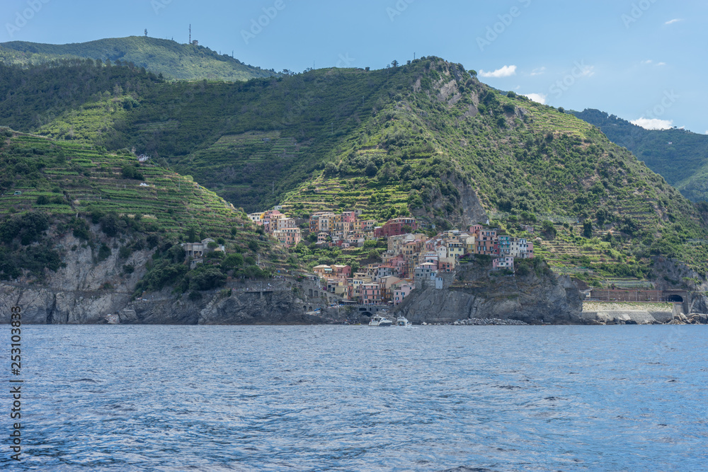Italy, Cinque Terre, Monterosso, Manarola, SCENIC VIEW OF SEA BY BUILDINGS AGAINST SKY