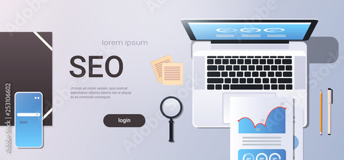 digital marketing search engine optimization seo concept top angle view workplace desktop with laptop smartphone screen analysis data office stuff horizontal copy space
