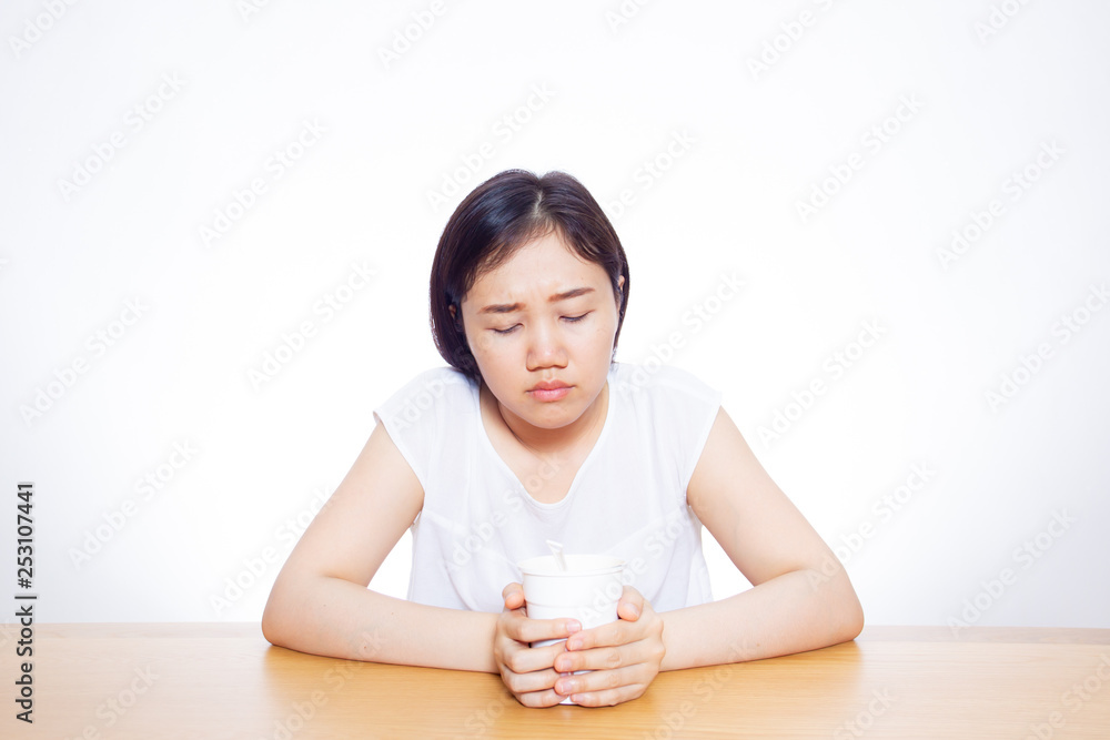 Hungry girl waiting for her noodle cup close up. Hungry girl waiting for her noodle cup close up.