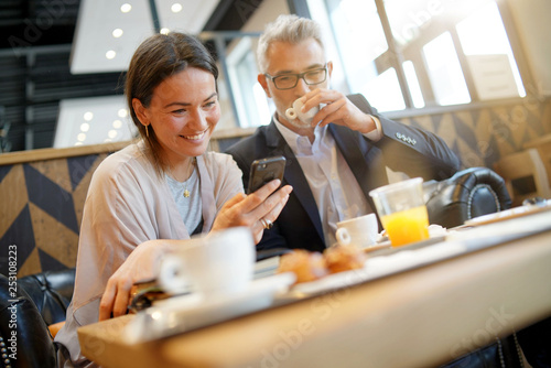 Informal breakfast meeting between salesman and manager