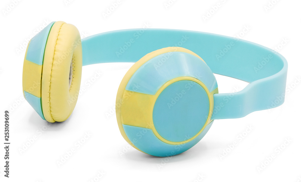 Obraz premium Close up on colorful green yellow wireless headphones isolated on white background.