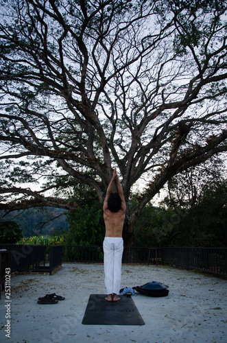 Man Practicing Yoga Outdoors