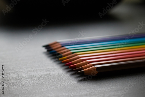color pencils and black background