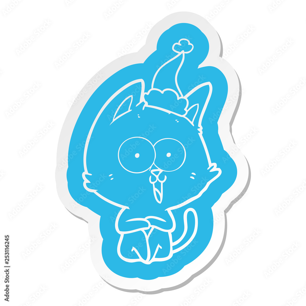 Obraz premium funny cartoon sticker of a cat wearing santa hat
