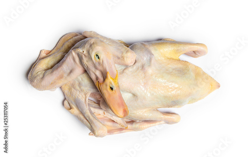 A raw duck ready for cooking on white background