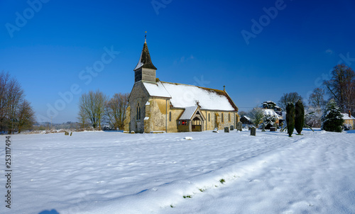Snowy view of the chapel of St Peter ad Vincula, Colemore, South Downs National Park, Hampshire, UK