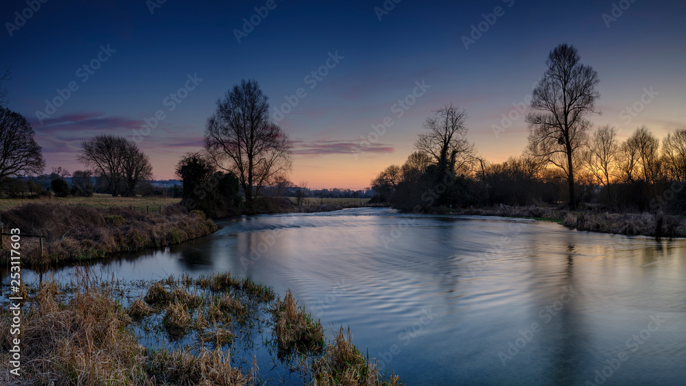 Sunset on the River Test near King's Somborne, Hampshire, UK Sunset on the River Test near King's Somborne, Hampshire, UK