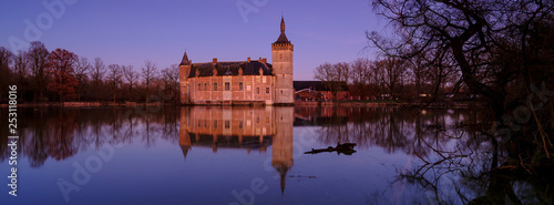 Calm sunset and reflections Kasteel van Horst near Holsbeek, Vlaanderen, Belgium photo