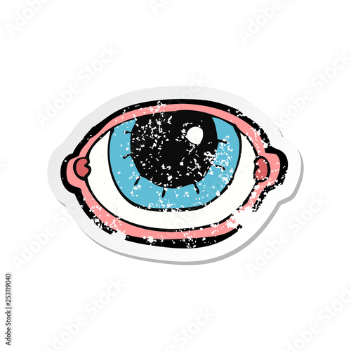 retro distressed sticker of a cartoon staring eye