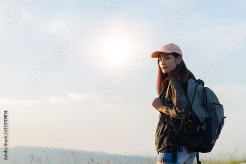 Asian young women people Hiking with friends backpacks walking together and looking map and taking photo camera by the road and looking happy ,Relax time on holiday concept travel