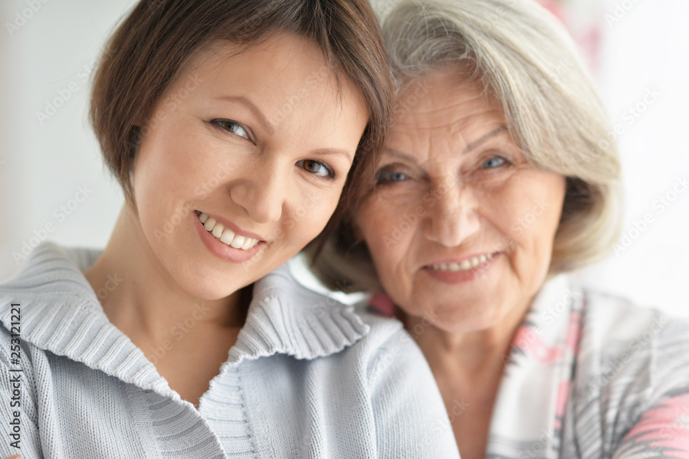 Portrait of beautiful senior woman with daughter Portrait of beautiful senior woman with daughter