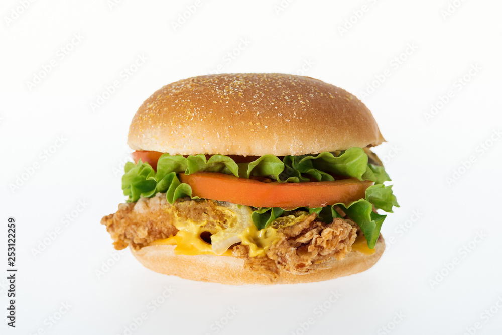 delicious unhealthy chicken burger isolated on white delicious unhealthy chicken burger isolated on white