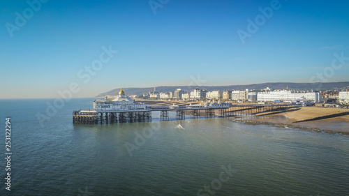 Aerial view over Eastbourne Pier at the south coast of England © 4kclips