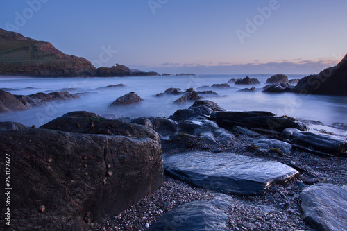 Sunset Arymer cove Devon Uk