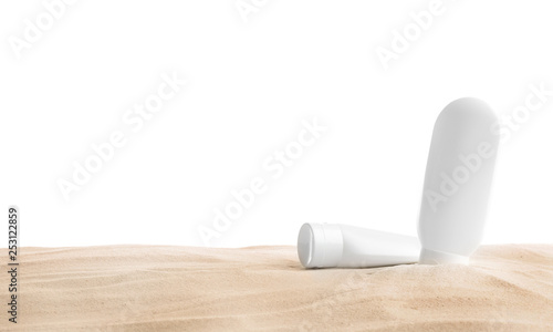 Composition with beach sand and cosmetic products on white background, space for text