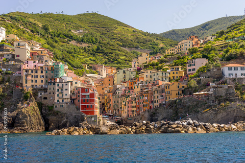 The cityscape of Riomaggiore viewed from the sea  Cinque Terre  Italy  Riviera
