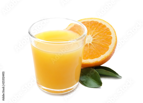 Glass of orange juice and fresh fruit on white background