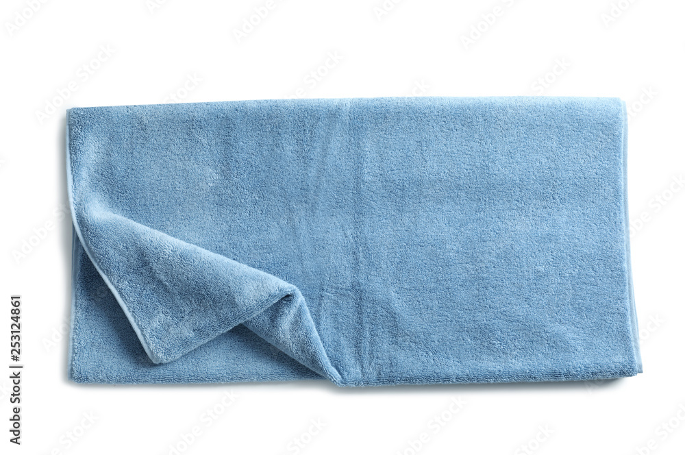 Soft folded towel isolated on white, top view Soft folded towel isolated on white, top view