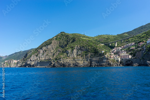 The cityscape of Riomaggiore viewed from the sea, Cinque Terre, Italy, Riviera