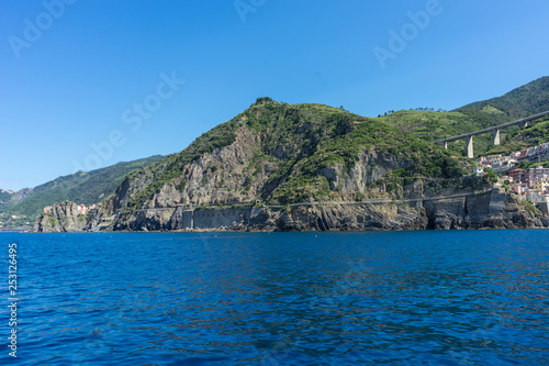 The cityscape of Riomaggiore viewed from the sea, Cinque Terre, Italy, Riviera